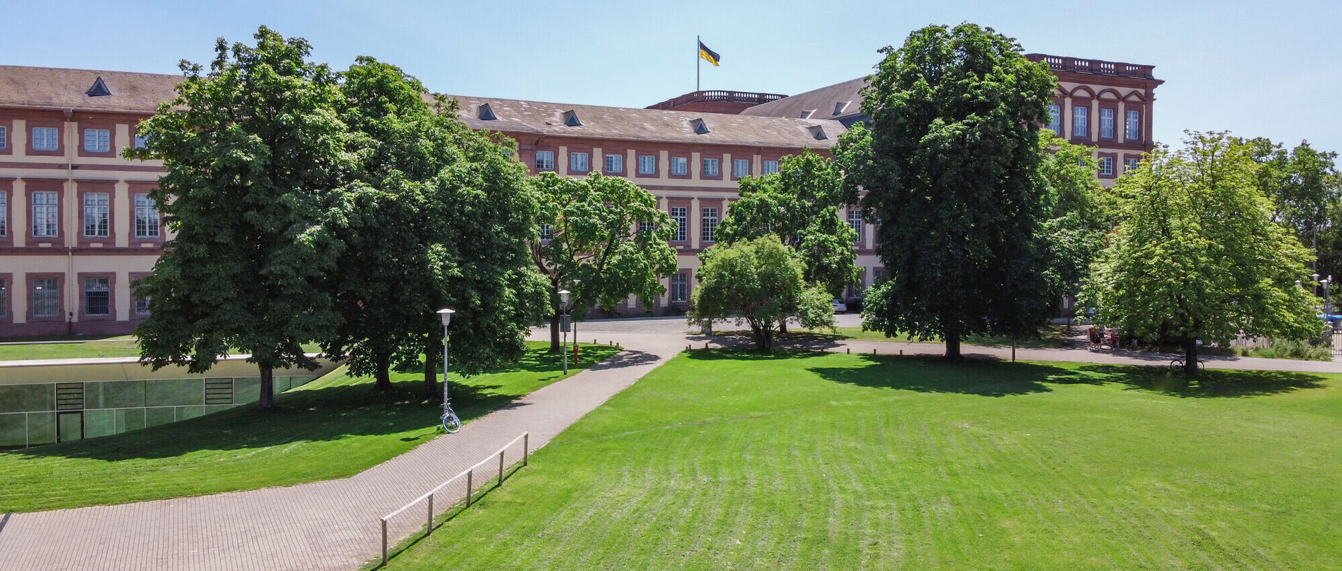 The view of the Mensawiese in front of the Westflügel of the Schloss.